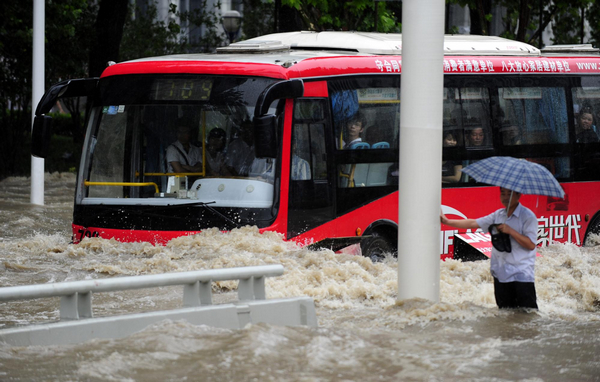 Wuhan wades through heavy rainstorm