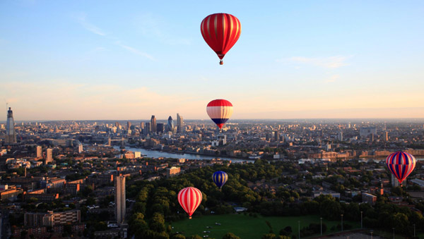 Hot air balloons rise over London