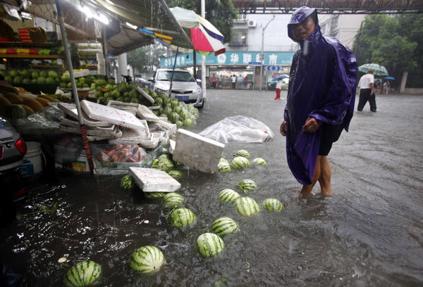 Heavy rain hits downtown Shanghai