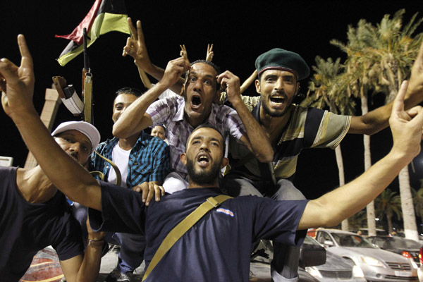 Libyans celebrate fall of Gadhafi's compound