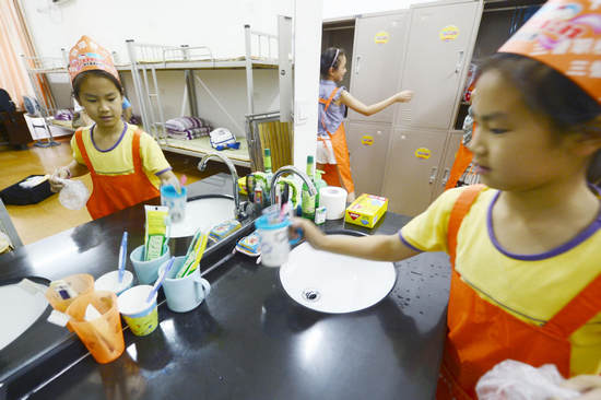 Summer camp teaches kids housework skills