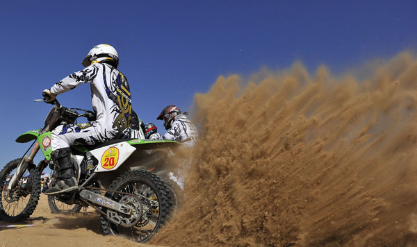 Motorcycles race through desert in NW China