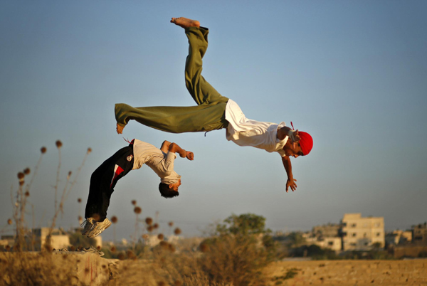 Palestinian youths show parkour skills