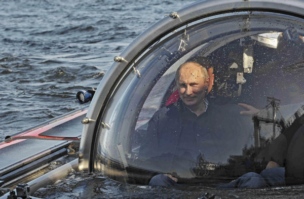 Russia's Putin takes a dive to boost his image