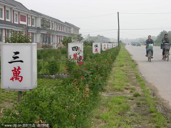 Mahjong tiles mark the way in N China