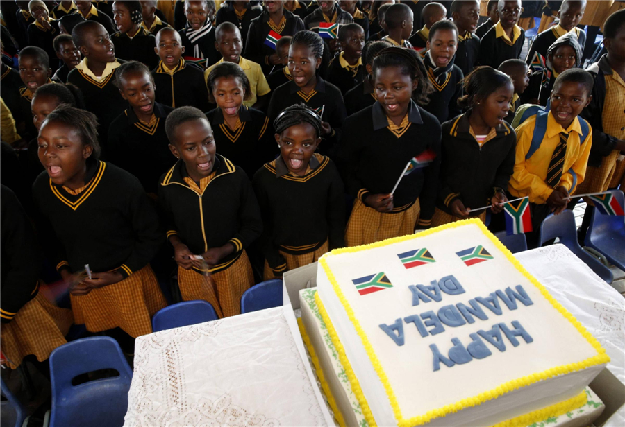 'Improving' Mandela marks 95th birthday