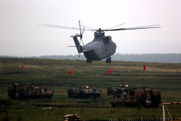 Chinese, Russian troops conduct 1st live fire exercises