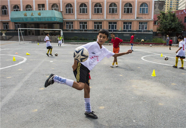 Soccer dreams for Xinjiang teens