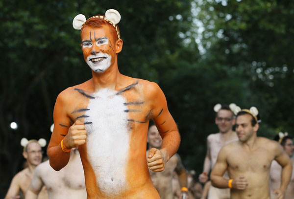 Streakers naked roar to save tigers