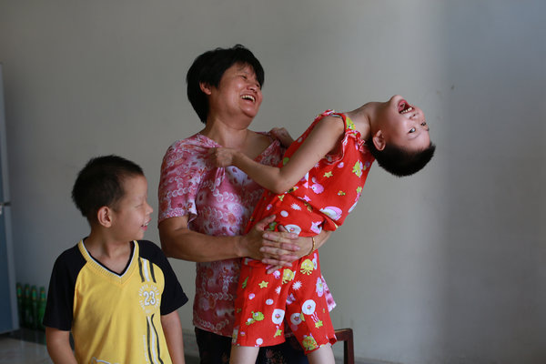 Orphans in C China experience family life