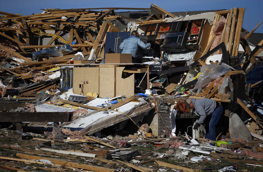 In pictures: Deadly tornados pound US Midwest