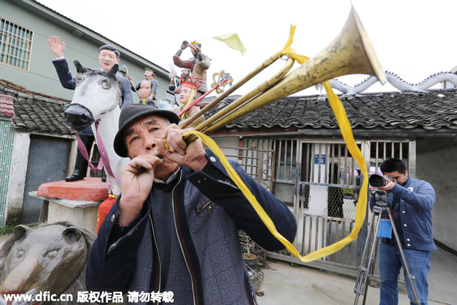 Zhejiang villager creates a world of clay