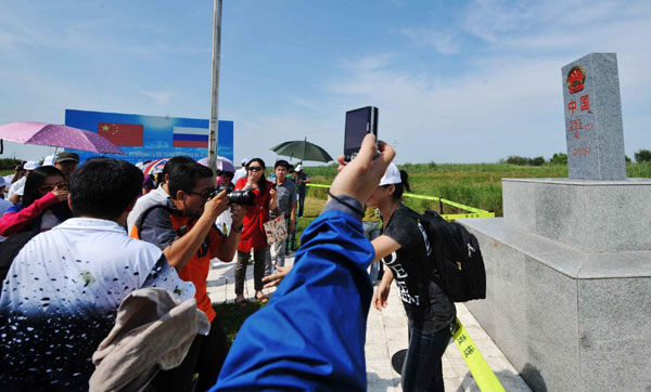 Sing-Russian border island opens to tourists