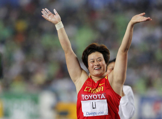 Li Yanfeng wins China's first world title in discus throw