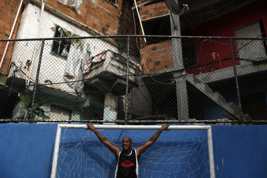 Soccer match in Rio de Janeiro's slum