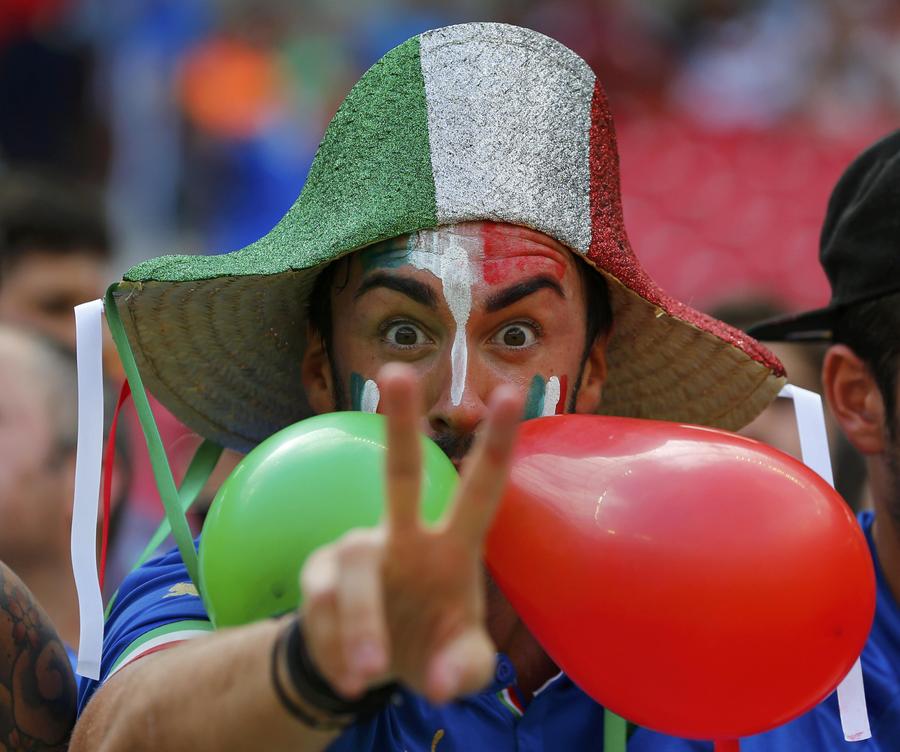 National flags on fan's face