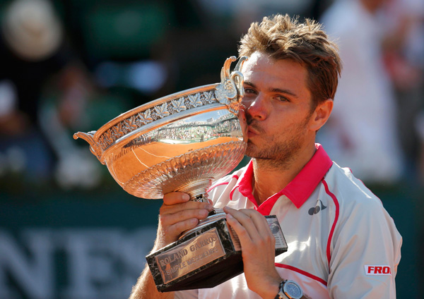 Inspired Wawrinka tames Djokovic to win French Open