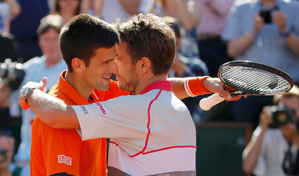 Inspired Wawrinka tames Djokovic to win French Open