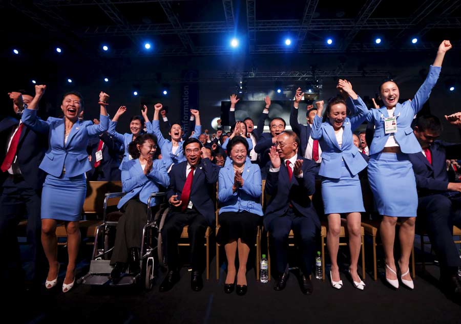 Chinese celebrate Beijing's win