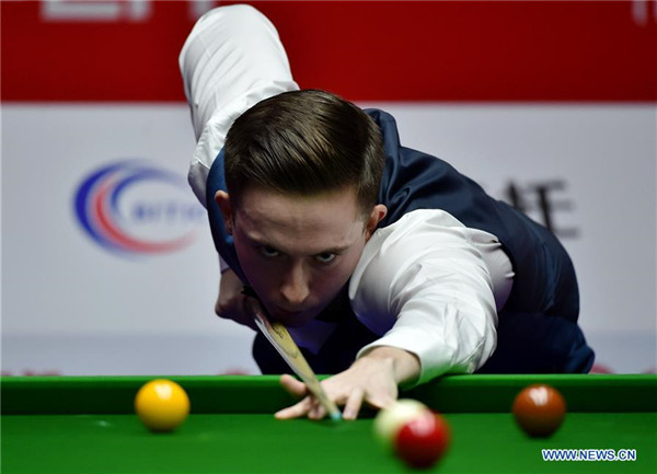 Ding Junhui, Judd Trump win at World Snooker China Open