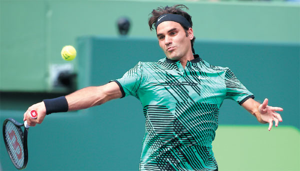 Feisty Federer focuses on fitness