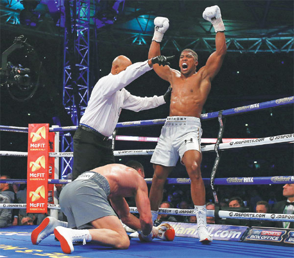 Joshua digs deep to vanquish Wlad