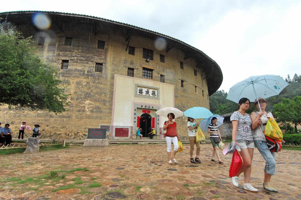 Tourists visit Tulous in Yongding, China's Fujian