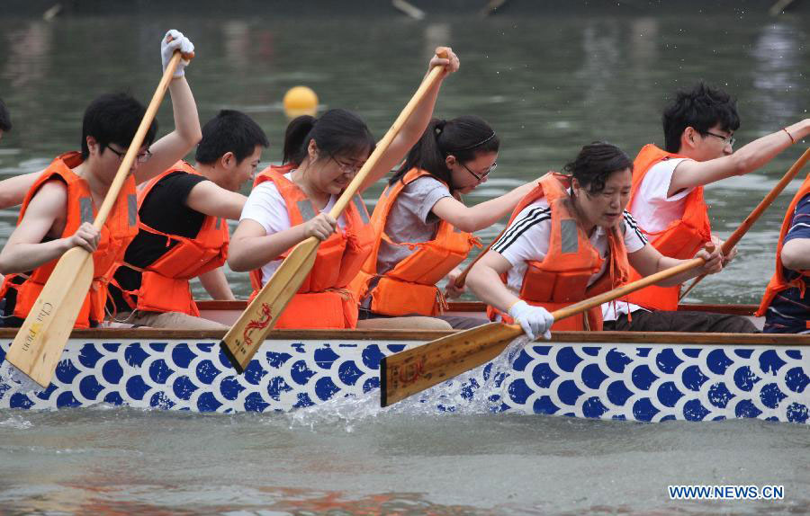 Dragon boats race on Qinhuai River in Nanjing