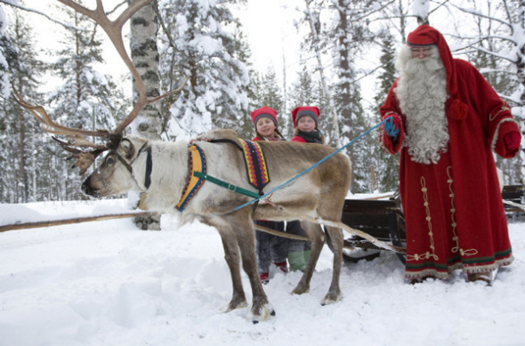 Asian tourists flock to the home of Santa Claus