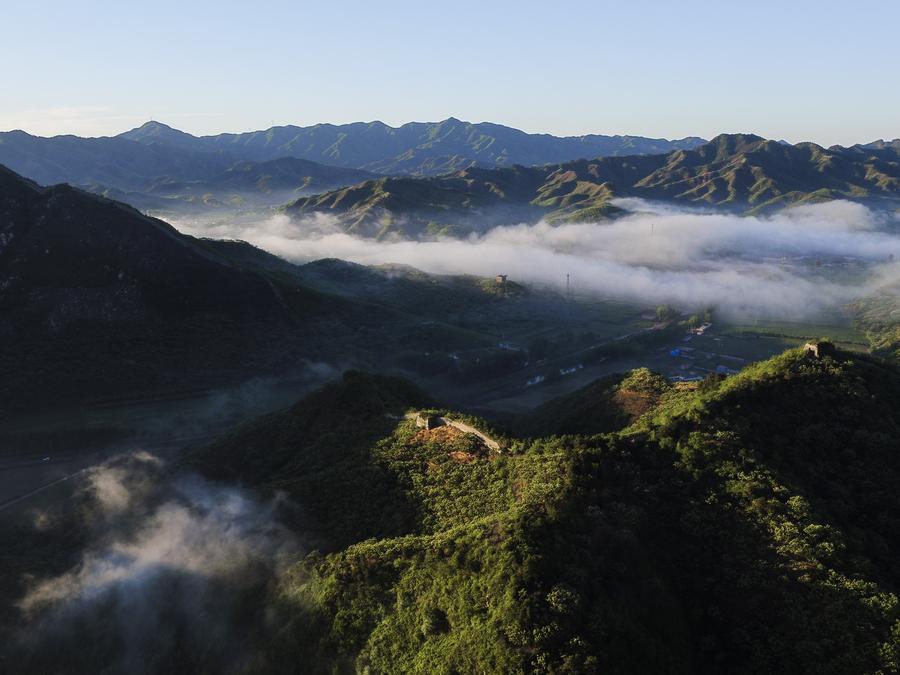 Aerial view of Great Wall surrounded by mist in N China