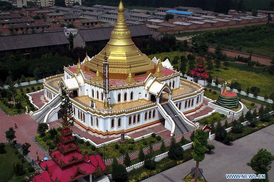 People visit Myanmar style shrine in C China's Henan