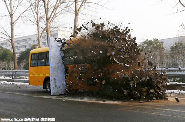 School bus withstands running through brick wall in safety test