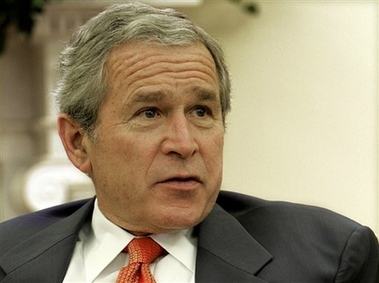 President Bush meets with wire service reporters in the Oval Office of the White House in Washington, Wednesday, Nov. 1, 2006. (AP