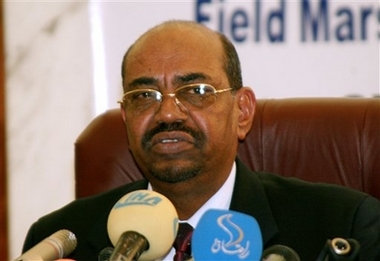 Sudanese President Omar al-Bashir addresses journalists from various Western capitals in a three-hour long video conference on Monday, Nov. 27 in Khartoum, Sudan. The Sudanese president on Monday again rejected United Nations troops in Darfur as 'colonial,' but hinted he was still trying to find a middle ground with the U.N. on how blue helmets could support the existing African peacekeeping force in the wartorn region. (AP