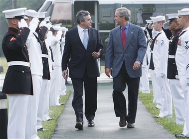 President Bush welcomes British Prime Minister Gordon Brown to the presidential retreat at Camp David, Md., Sunday, July 29, 2007. (AP