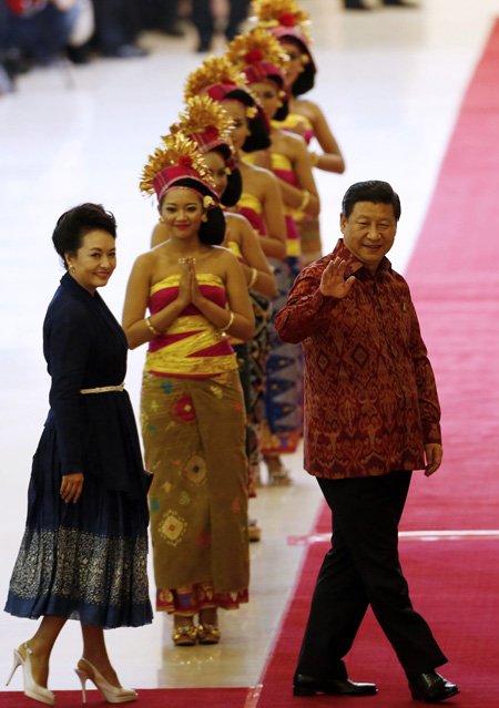 In Bali, they relax in local fashions