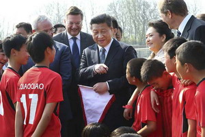 Belgium's Chinese beam at Xi's arrival