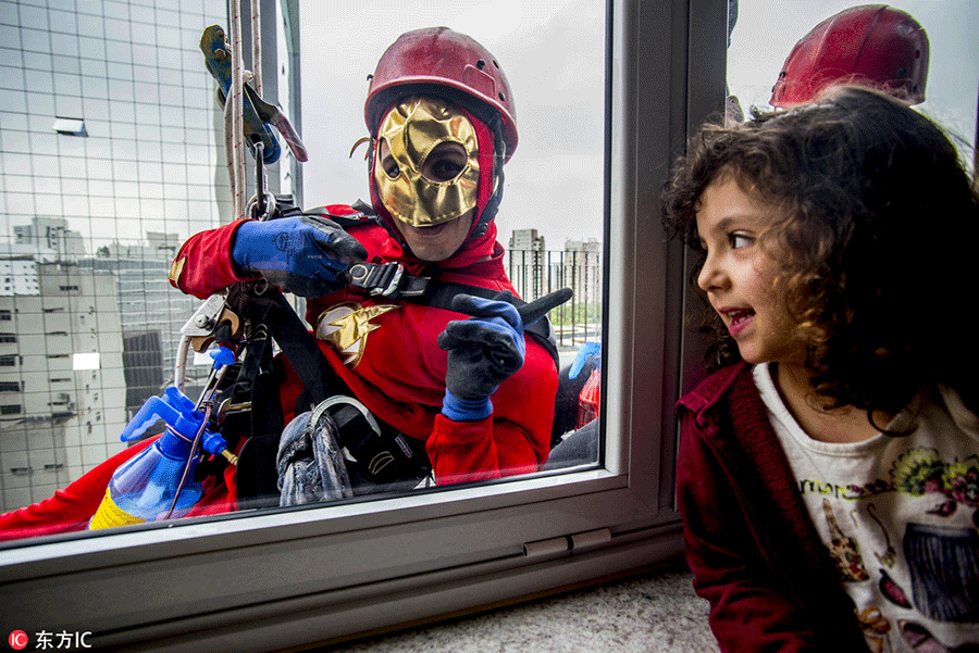 Superheroes cheer up sick children in Sao Paulo