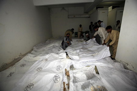 62 migrants dead inside container in Pakistan