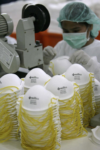 Masks production increased in Asia as flu spreads