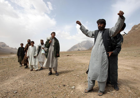 US Marines patrol Afghan mountainous district