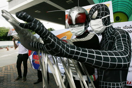 Spideman wears mask in flu-hit Bangkok