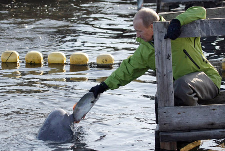 Russia's Putin dives for gas crystals in deepest lake