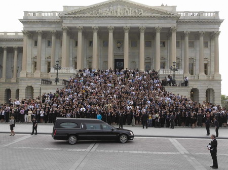 Kennedy carried to Arlington, laid beside brothers