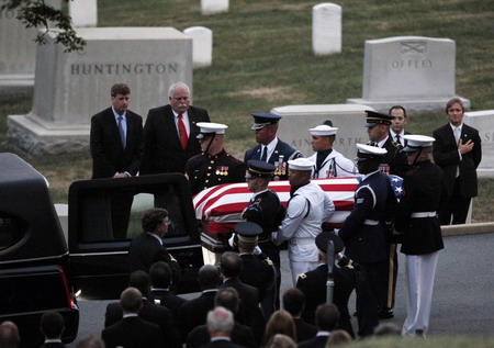 Kennedy carried to Arlington, laid beside brothers