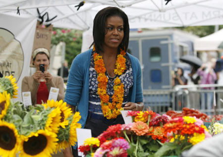 Michelle Obama attends market opening