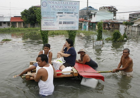 Tens of thousands in Philippines flee new typhoon