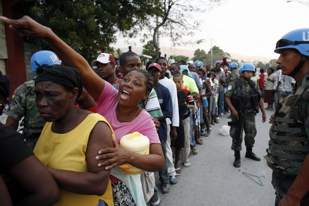 Haiti aid groups: Cash now, goods later