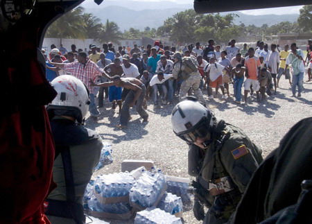 Hunger and hope, thirst and frenzy grip Haiti