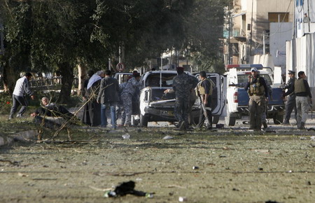 Explosions rock Baghdad hotels, at least 36 dead